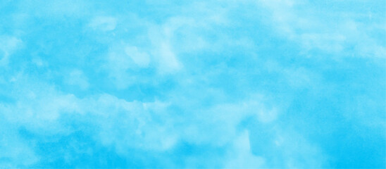 soft and lovely sky blue watercolor background with clouds, Sky clouds with brush painted blue watercolor texture, small and large clouds alternating and moving slowly on cloudy winter morning sky.