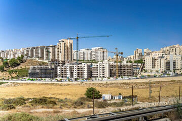 Construction of Israeli Settlements in the west bank - obrazy, fototapety, plakaty