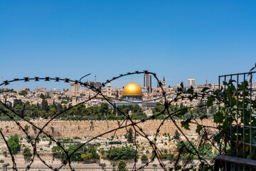 Barbed wire in front of the Dome of the Rock in Jerusalem, Israel