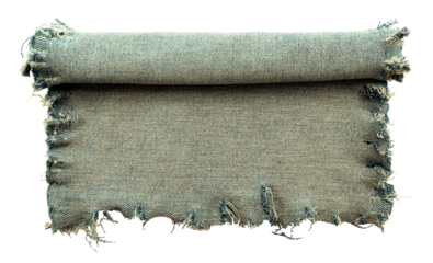 Piece of torn denim on a white background. Denim texture