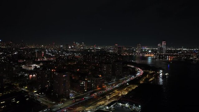 Night aerial drone video Lower East Side New York traffic lights FDR Drive 2023