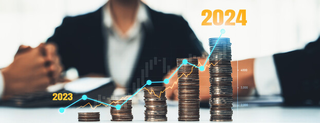 Growth coin stack symbolizing business investment and economic growth. Business people doing financial planning to achieve financial goal and contribute maximum profit on new year 2024 . Shrewd - obrazy, fototapety, plakaty