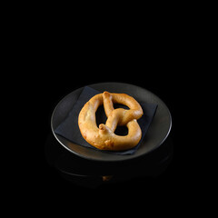 bagels on a black plate