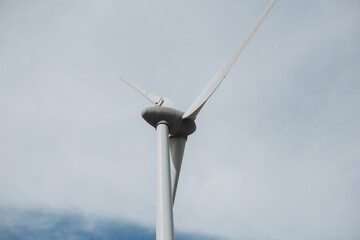 Generating Electricity. Close-up of wind turbine blade with motion effect, showing how wind energy is converted into electricity.