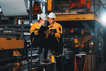 Professional quality control inspector conduct safety inspection on steel machinery and...