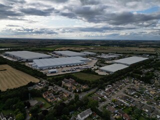 Aerial view of Industrial Warehousing Raunds during cloudy weather in the UK