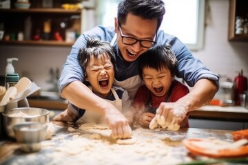 A view of a asian father with two children engaged in a fun cooking or baking activity, illustrating the joy of culinary bonding, selective focus, shallow depth of field, blurred - obrazy, fototapety, plakaty