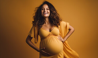 Expectant mother tenderly touching her baby bump.