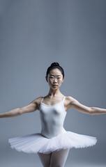 Portrait of an asian beautiful female ballet dancer with copy space