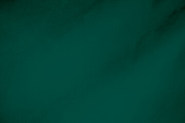 Green velvet fabric texture used as background. Emerald color panne fabric background of soft and...