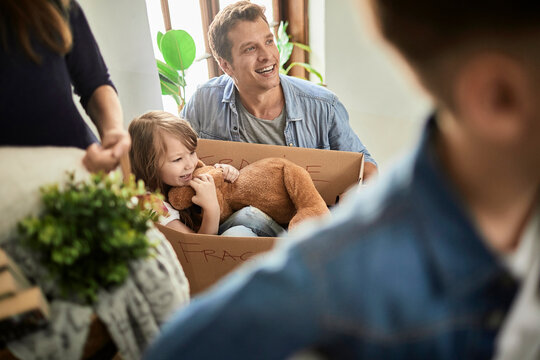Young family moving in their new home