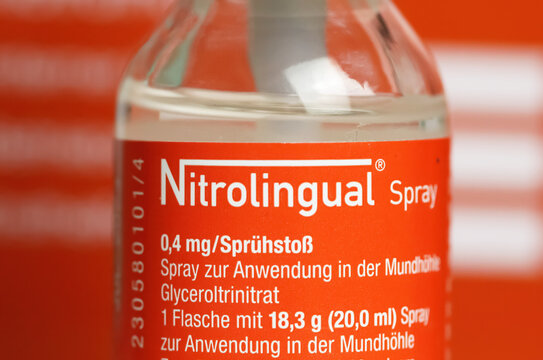 Viersen, Germany - October 9. 2023: Closeup of spray bottle nitrate Nitrolingual for acute angina pectoris  treatment