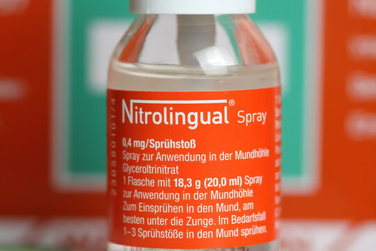 Viersen, Germany - October 9. 2023: Closeup of spray bottle nitrate Nitrolingual for acute angina pectoris  treatment