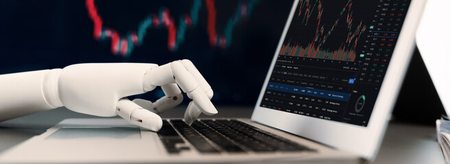 Automated stock trading concept. Robotic hand analyzing financial data on stock exchange, artificial intelligence utilization to predict precise price change in stock market. Trailblazing - obrazy, fototapety, plakaty