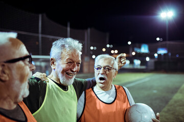 Group of senior men on a soccer field
