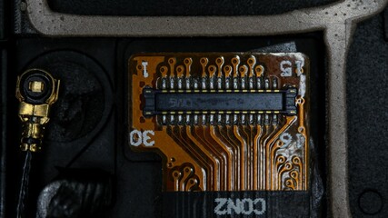 the closeup of a circuit board with keys and wires