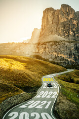 2024 New Year road trip travel and future vision concept . Nature landscape with highway road...