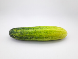 cucumbers isolated on a white background, this fruit contains a lot of water so it is very refreshing but tastes bland, can be eaten directly or cooked, often also used as a garnish or facial mask