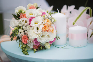 Elegance wedding decorations. Wedding bouquet for the bride and groom at an event. Spring bouquet of mixed flowers on table. Wonderful luxury wedding bouquet of different flowers. 