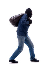 Young male burglar stealing money isolated on white