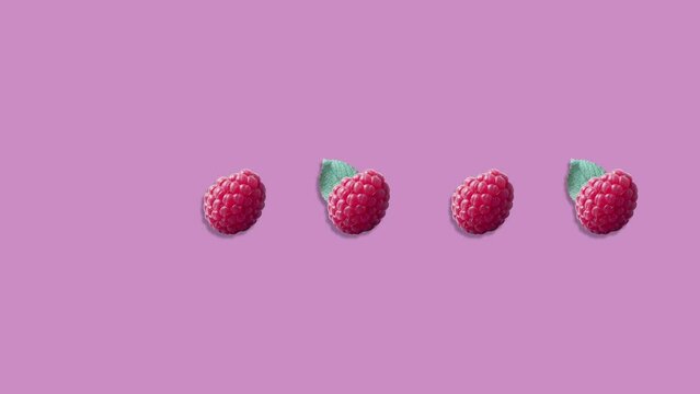 Stop motion Cut and whole Raspberry appear and disappear on pastel background. High quality video 4K. Detailed stop motion video. Background or wallpaper in food and drinks videos.