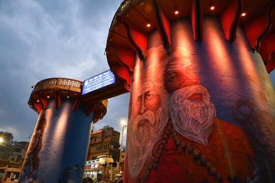 VARANASI, INDIA - November 13, 2022: View of picture Indian sadhu (holy man) on wall of Varanasi building