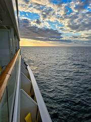 Sunset from the open deck of luxury cruise ship - 672918423
