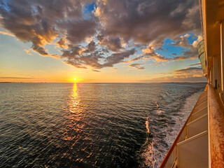 Sunset from the open deck of luxury cruise ship - 672918444