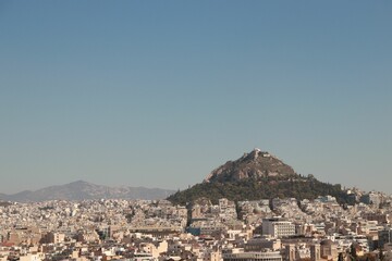 Beautiful view of Mount Lycabettus and Kolonaki district from the Areopagus Hill, Athens, Greece