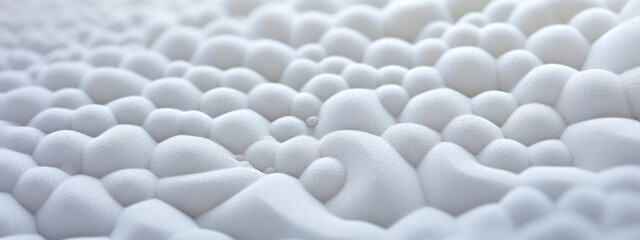 Macro shot of white foam texture.
