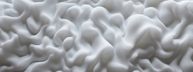 Macro shot of white foam texture.