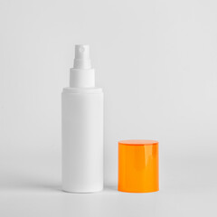 White plastic spray  bottle. Mockup for cleaning products, liquid products, chemical and water.