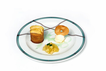 Apple dessert in syrup with ice cream and sweet bread in mint sauce