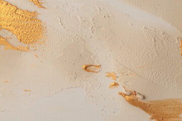 Art oil and acrylic smear blot canvas painting stucco wall. Abstract texture white, beige, gold...