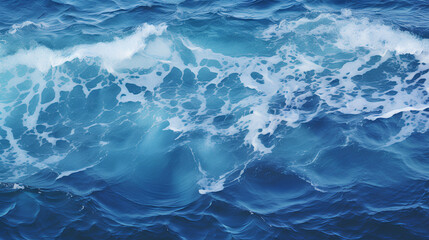 Fototapeta premium Blue and crystalline water. Waves in the ocean. View from above. Textured background.