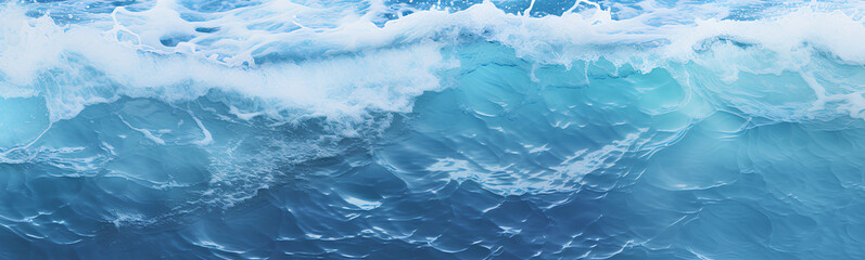 Fototapeta na wymiar Blue and crystalline water. Waves in the ocean. View from above. Textured background.