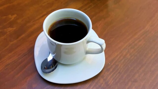 Cup of americano black coffee in restaurant Mexico.