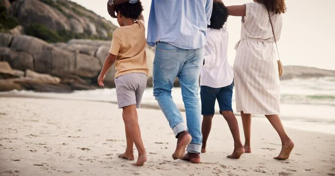 Walking, happy family on beach together and holding hands on tropical adventure holiday from back. Nature, summer vacation and mother, father and children at ocean to relax, outdoor fun and bonding.