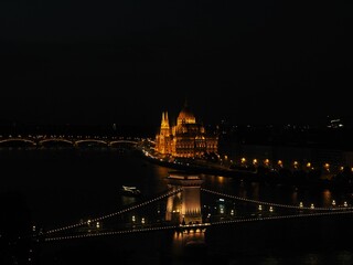 Fototapeta na wymiar Aerial view of the Parliament building in Budapest, Hungary illuminated at night