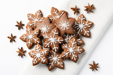 Christmas gingerbread cookies on a white background, holiday festive background