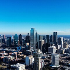 Aerial view of the cityscape of Dallas, Texas on a sunny day