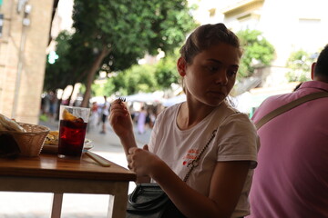 Women eating Spanish food in the restaurant