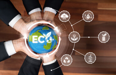 Business partnership holding Earth globe together with eco design icon symbolize ESG sustainable...