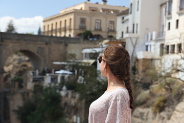 Fototapeta premium Women in front of Puente Nuevo bridge in Ronda Spain