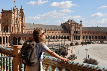 person in front of seville plaza de espana