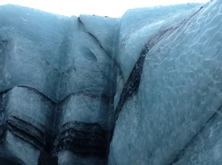 Rolgordijnen Close-up photo of a melting iceberg. Global warming concept © Vitaliy