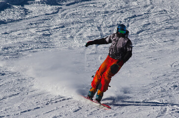 Winter sports - Snowboarder on a slope - obrazy, fototapety, plakaty