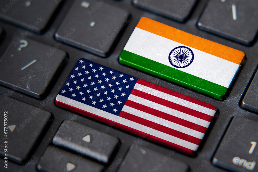 Poster usa and india flags on computer keyboard
