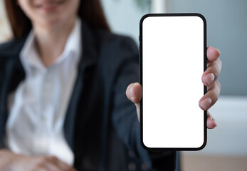 Mock up mobile phone, business woman showing blank screen mobile smartphone for social media marketing design, website template or product advertisement, front view