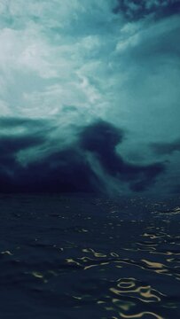 Dark Ocean View with stormy Clouds on the Horizon vertical video